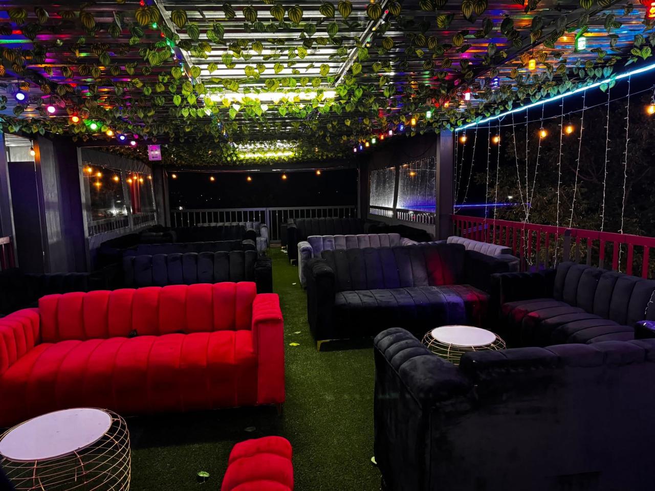 Outdoor lounge seating area at Magopane Liquor Restaurant